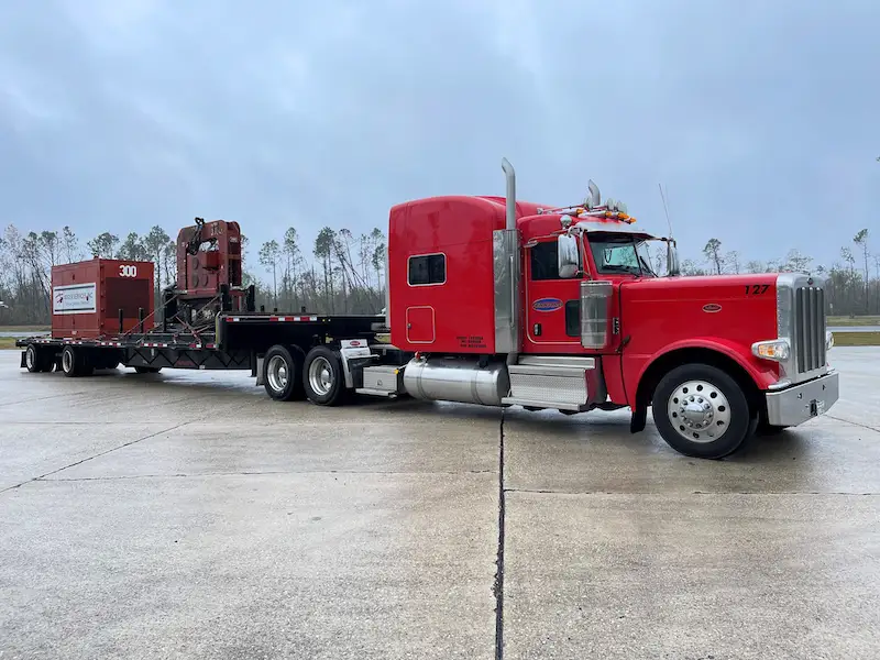 ferrara transport services in baton rouge red semi with trailer
